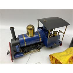 '0' gauge - live steam 0-4-0 locomotive in blue and black with brass fittings, no maker's name, with steam oil and syringe; unboxed
