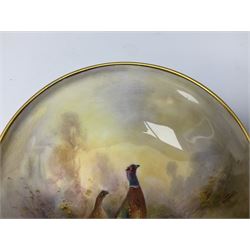 1938 Royal Worcester circular pedestal pin dish, decorated with pheasants in a landscape by James Stinton, with printed mark beneath, D10.5cm