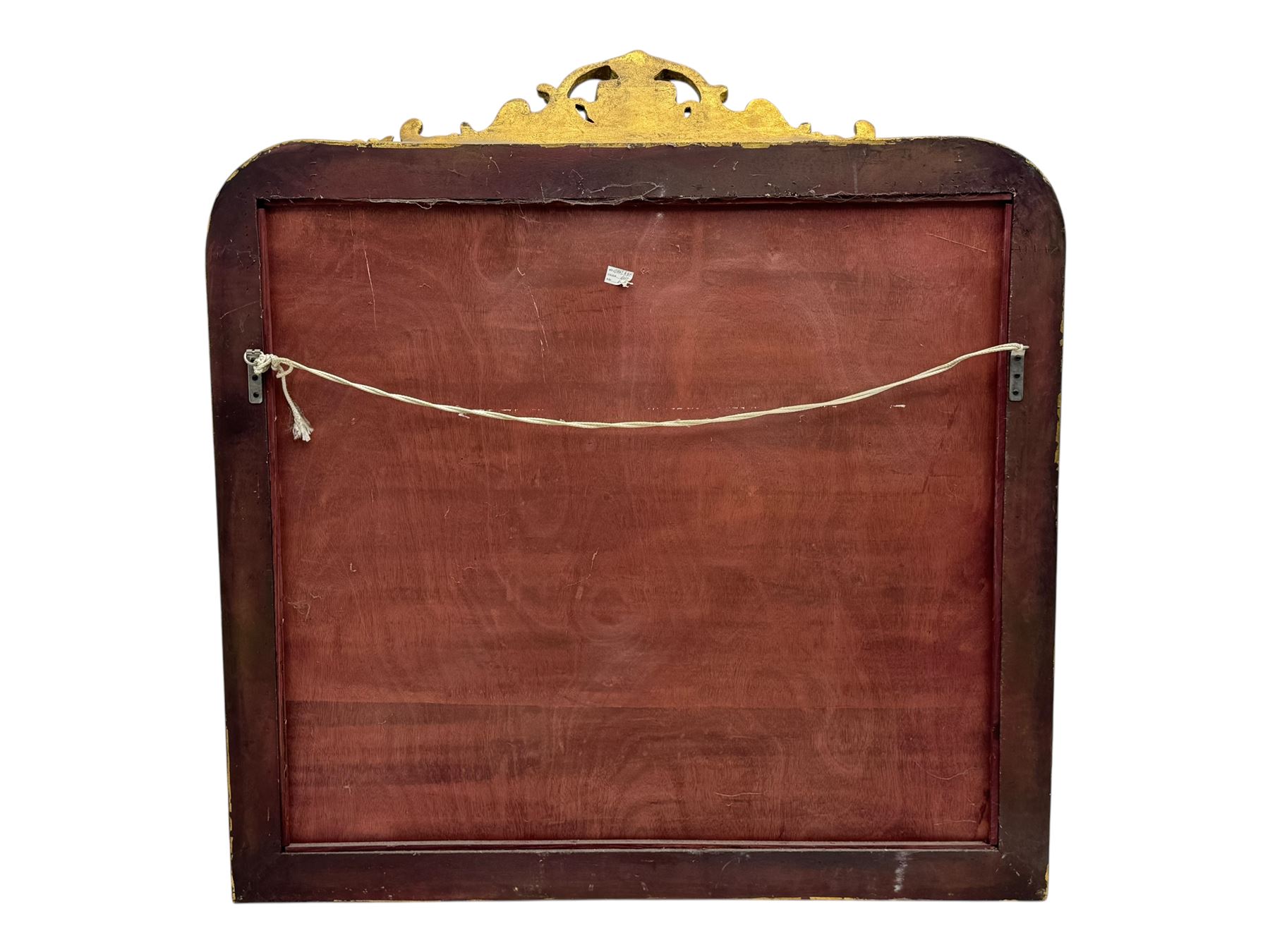 18th century design ornate gilt framed overmantle mirror, bevelled mirror plate within arched frame with pierced pediment featuring foliate and scrollwork designs