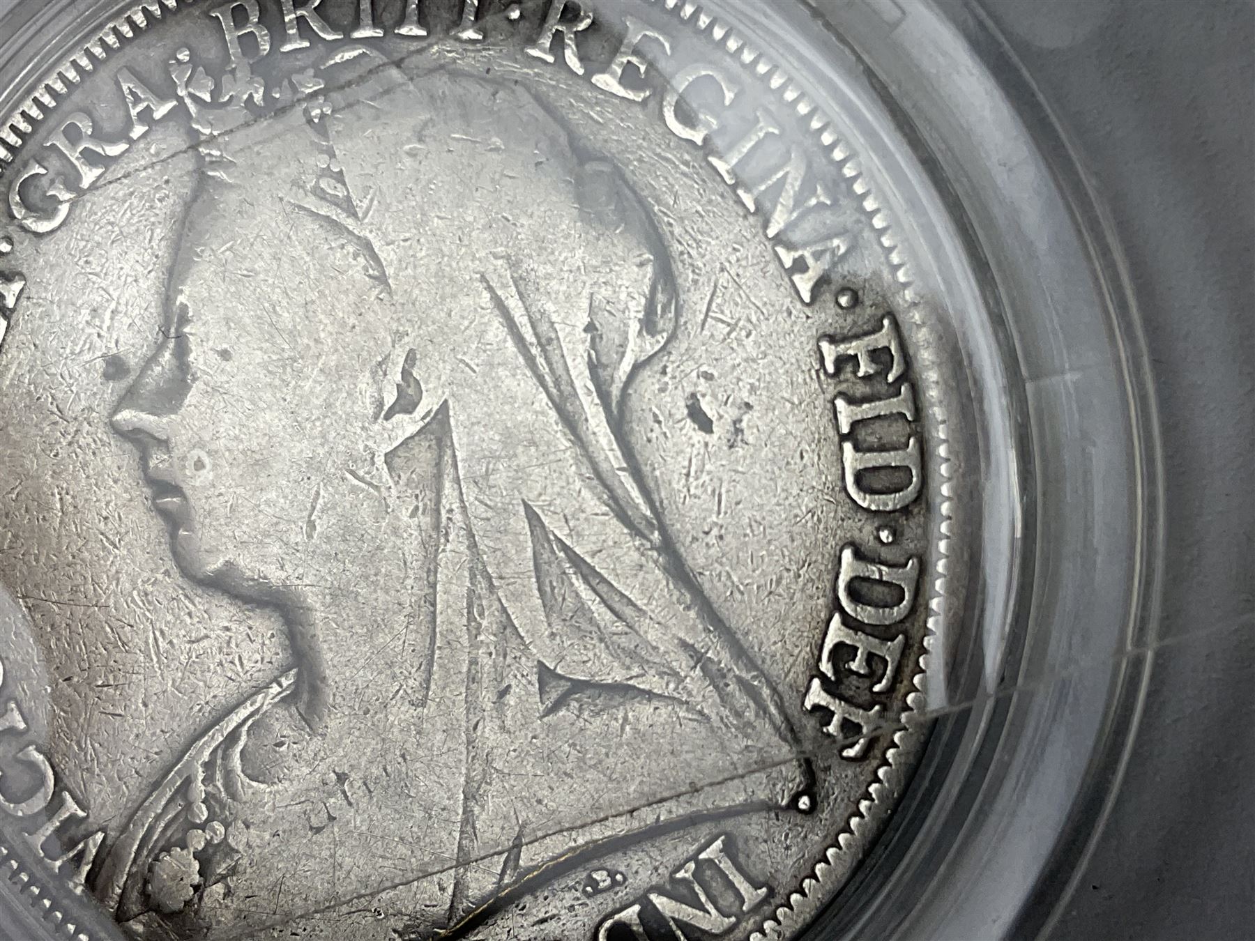 Charles I 1625 hammered silver sixpence, Queen Victoria 1894 crown coin and a cased hallmarked silver medal for the Hull photographic society, engraved '1940' 'Leonard Vokes', all housed in a red Pobjoy Mint coin box