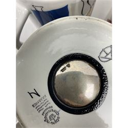 Set of three Royal Copenhagen year mugs, comprising 1976 with silver plaque stamped 925 beneath, and two 2000 examples, H11.5cm