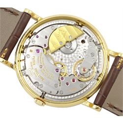 Patek Philippe 18ct gold perpetual calendar automatic wristwatch, Ref. 5039J, Cal. 240 Q, Movement 27 jewels, No. 775255, silvered dial with moon phases, 24 hour and leap year indication, with Patek Philippe Certificate of Origin, purchased 24 April 1997, service history, on Patek brown leather strap with 18ct gold buckle and additional black leather strap