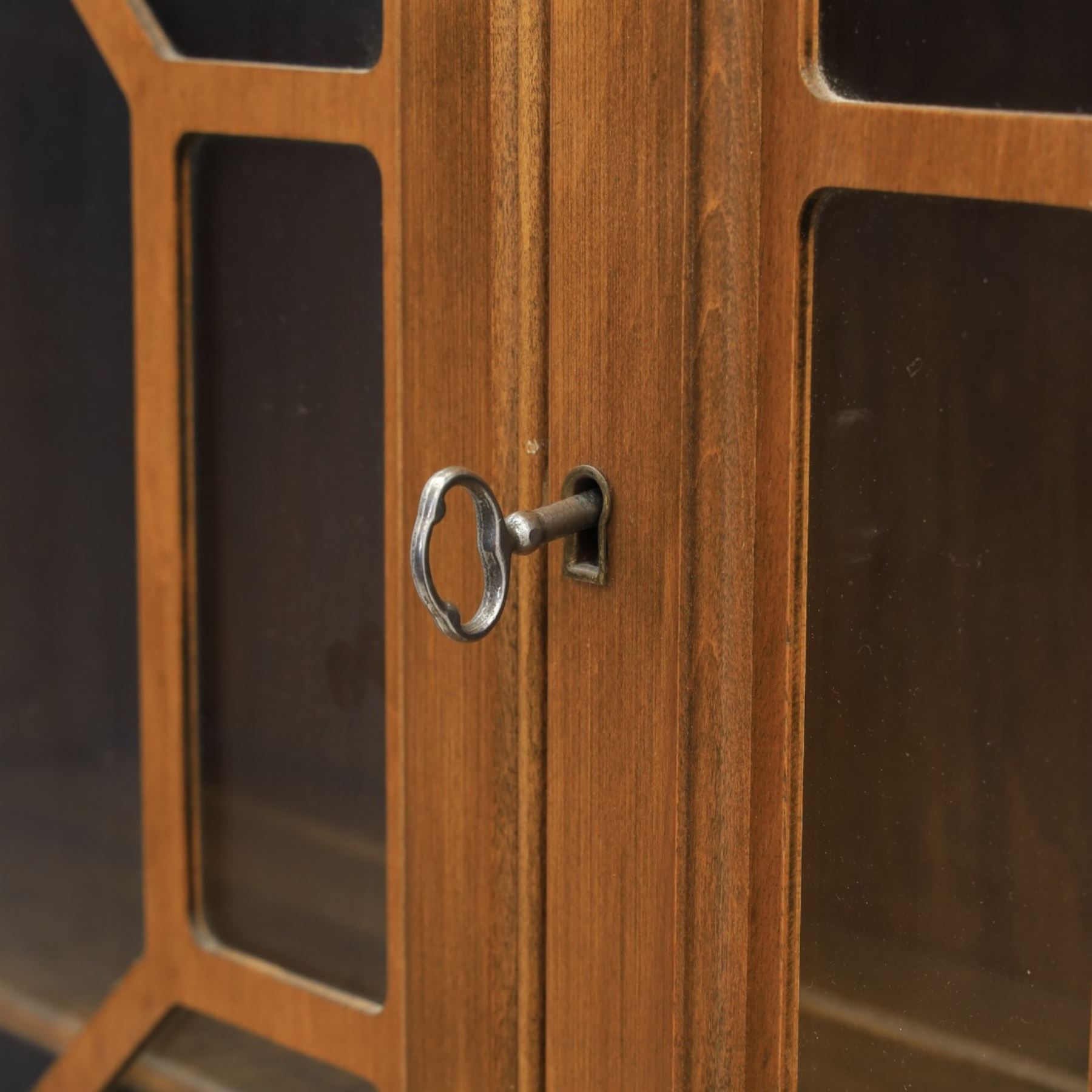 Maddox of Jamestown New York - Georgian design mahogany bureau bookcase, broken arch pediment with central finial, astragal glazed bookcase, above a fall front writing slope with fitted interior, four serpentine drawers, raised on claw on ball feet 