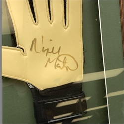 Pair of 1990s Leeds United goalkeeper's gloves signed by Nigel Martyn and Paul Robinson, mounted in a wall hanging framed display with signed pictures of each player 60 x 55cm. Provenance: the vendor was a coach at the keepers' club Leeds United and the gloves were signed for him.