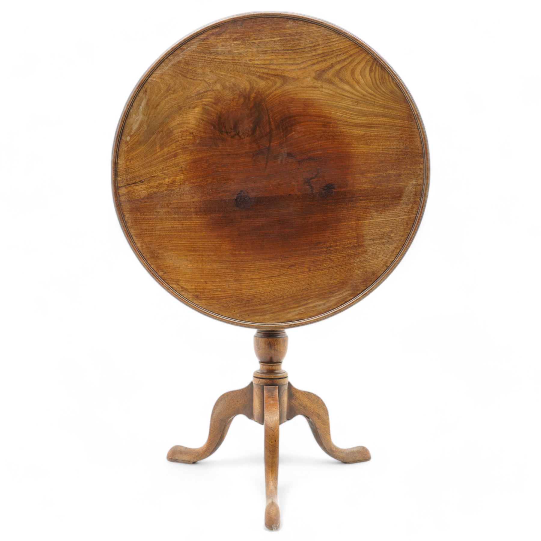 George III mahogany tripod table, circular dished tilt-top with moulded edge on cage action, baluster turned pedestal with three splayed supports 