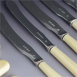 Set of six Victorian silver dessert knives and forks, with ivorine handles, hallmarked William Hutton & Sons (Edward Hutton), London 1880