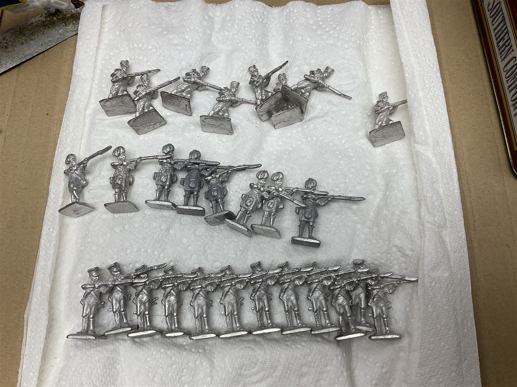 Large variety of predominantly metal miniature soldiers, a mixture of painted and non-painted figures, to include examples of American, British and European soldiers 