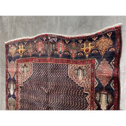 Persian Hamadan blue ground rug, medallion on field decorated with repeating motifs, the guarded border with multiple medallions decorated with flower heads and stylised motifs