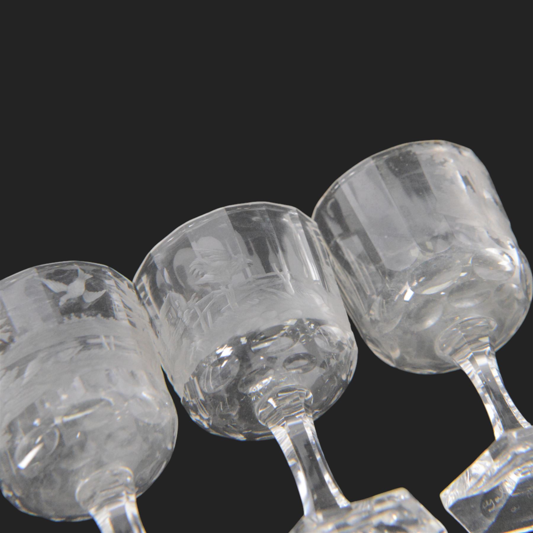 Set of four Galle, Nancy, intaglio engraved liqueur glasses, Gallé, Nancy, circa 1880, each with faceted bucket bowl engraved with animals within landscape settings, upon hexagonal stems and hexagonal feet, two examples engraved 'Galle Reinemer a Nancy', one engraved 'Galle a Nancy', and one unsigned, H7cm