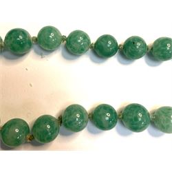 Chinese jade bead necklace with silver open work clasp with a cabochon greenstone/possibly jade bead necklace, signed Liu with Chinese character marks