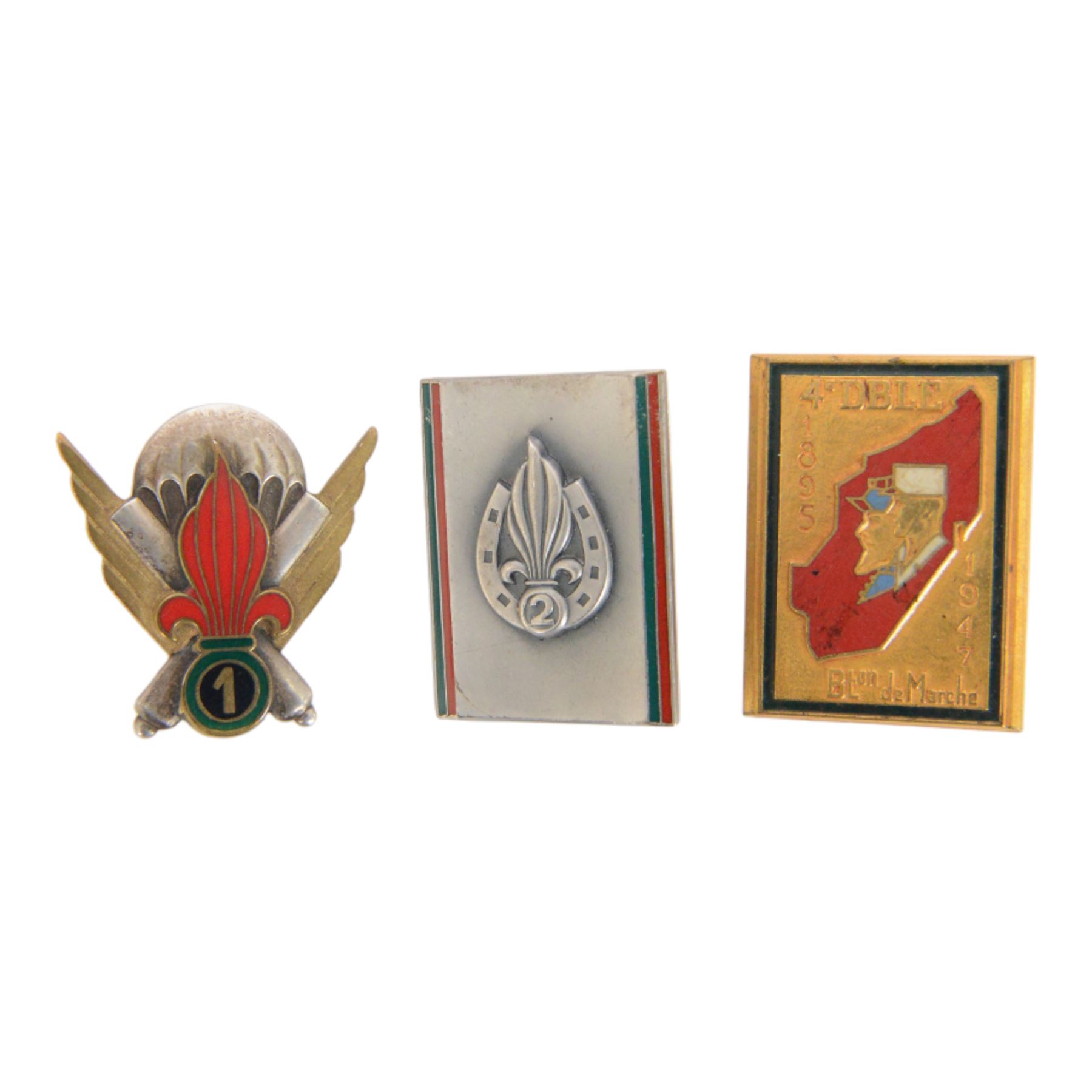 French Foreign Legion etrangere badges comprising seven  Kepi Blance Replacements and two Legion Cavalerie badges
