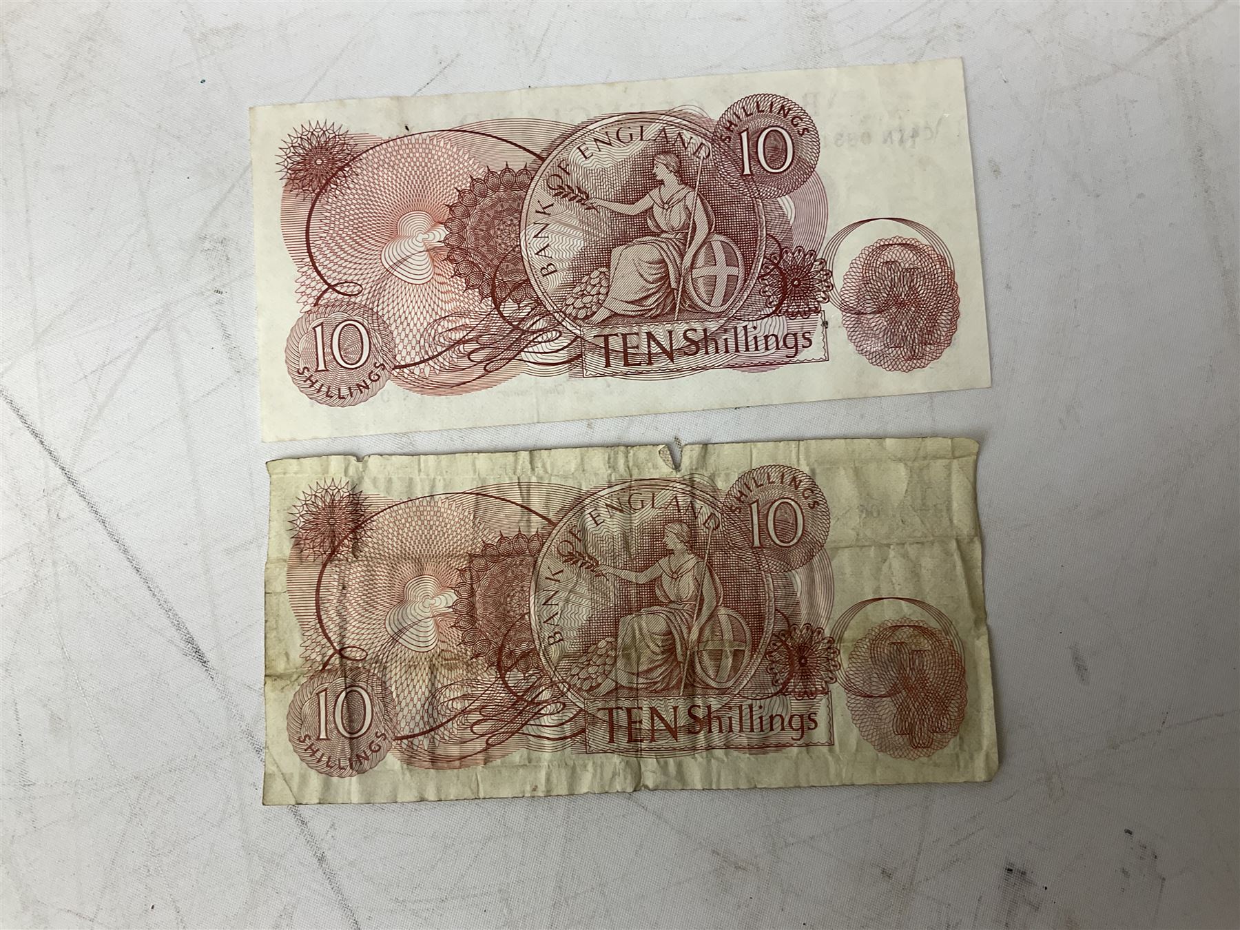 Great British and World banknotes, including Bank of England Page one pound 'EW57', Forde ten shillings 'C41N', various Belgian and Scottish notes etc