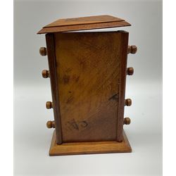 An early 20th century oak perpetual desk calendar, with three glazed apertures for day, date and month, H20cm
