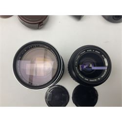 Collection of camera bodies and lenses, to include Olympus OM-1 camera body, serial no 106567, with 'Olympus OM-System F.Zuiko Auto-S 1:1.8 f=50mm' lens, serial no 135097,  Zenit-B camera body, serial no 71017867, with 'Helios-44-2 2/58' serial no 7500040, Voigtlander Vito B camera body, with 'Voigtlander Colour Skopar 1:2.8/50' lens, 'Olympus OM-System Zuiko Auto-Zoom 1:4 f=75-150mm' lens serial no 104321, 'Tamron SP 35-210mm 1:3.5-4.2' lens etc 
