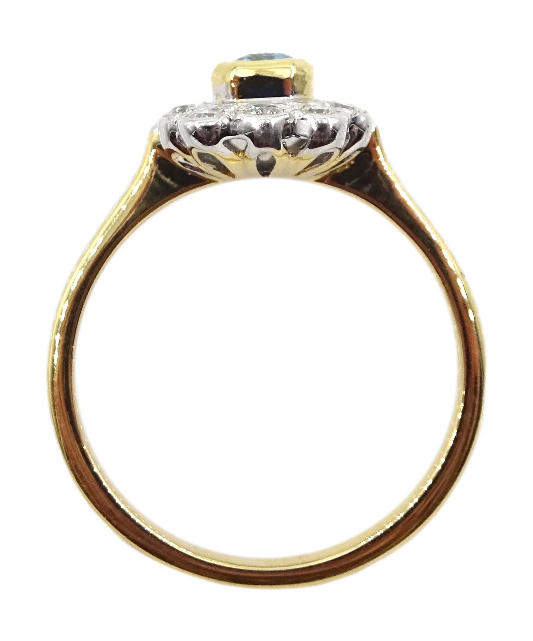 18ct gold emerald cut aquamarine and round brilliant cut diamond cluster ring, hallmarked, aquamarine approx 0..60 carat, total diamond weight approx 0.30 carat