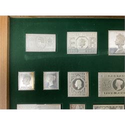 The Stamps of Royalty collection consisting of twenty-five sterling silver hallmarked stamp replicas, housed in a fitted wooden display case, with certificates, polishing cloth and certificates