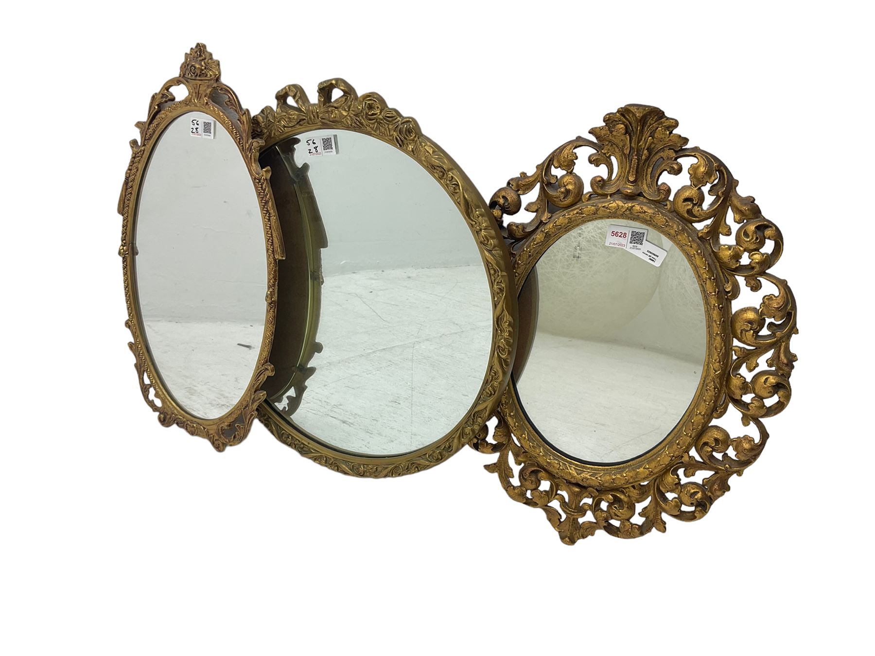 Victorian design gilt cast metal wall mirror, pierced scrolled foliate frame with cartouche decoration (47cm x 37cm); together with two others similar