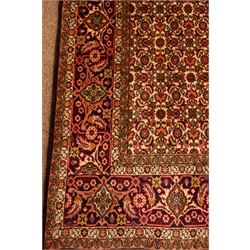 Persian Bijar rug carpet, central lozenge within larger lozenge, all over motif decoration, five band border, 350cm x 250cm  