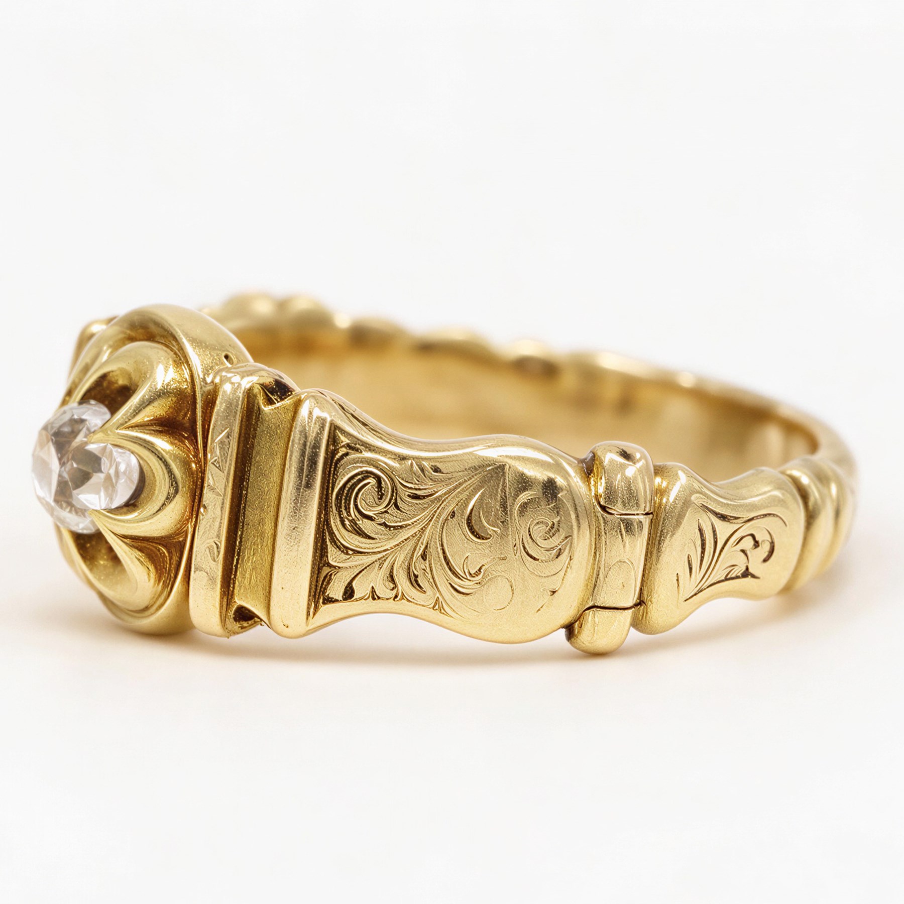 Victorian 18ct gold diamond ring, single cushion shaped old cut diamond of approx 0.45 carat, in an eight claw buttercup setting, to a foliate engraved shank