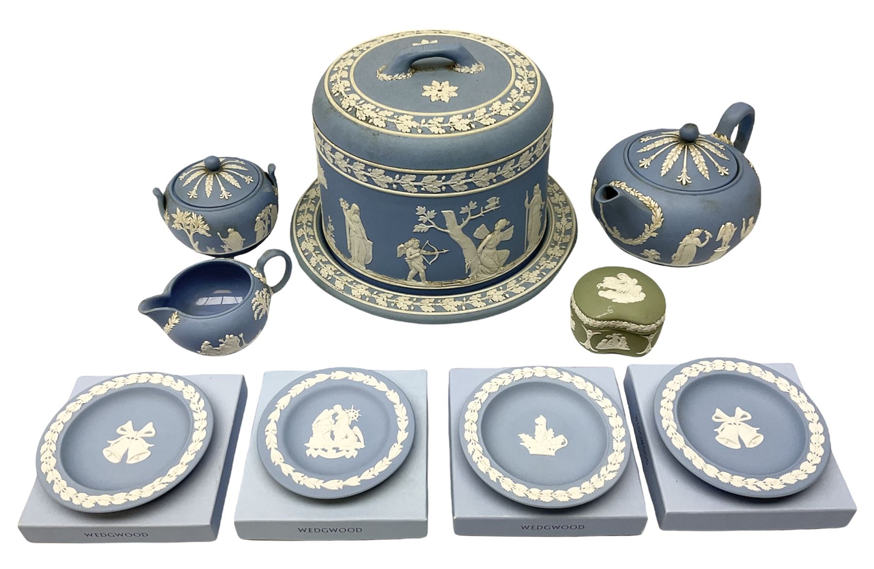 Late 19th century pale blue Wedgwood Jasperware cheese dome with cover, decorated with acorn and oak leaf bands surrounding neo-classical ladies, cherubs, flowers and trees, impressed Wedgwood mark beneath, together with further Wedgwood Jasperware teapots, boxed dishes etc