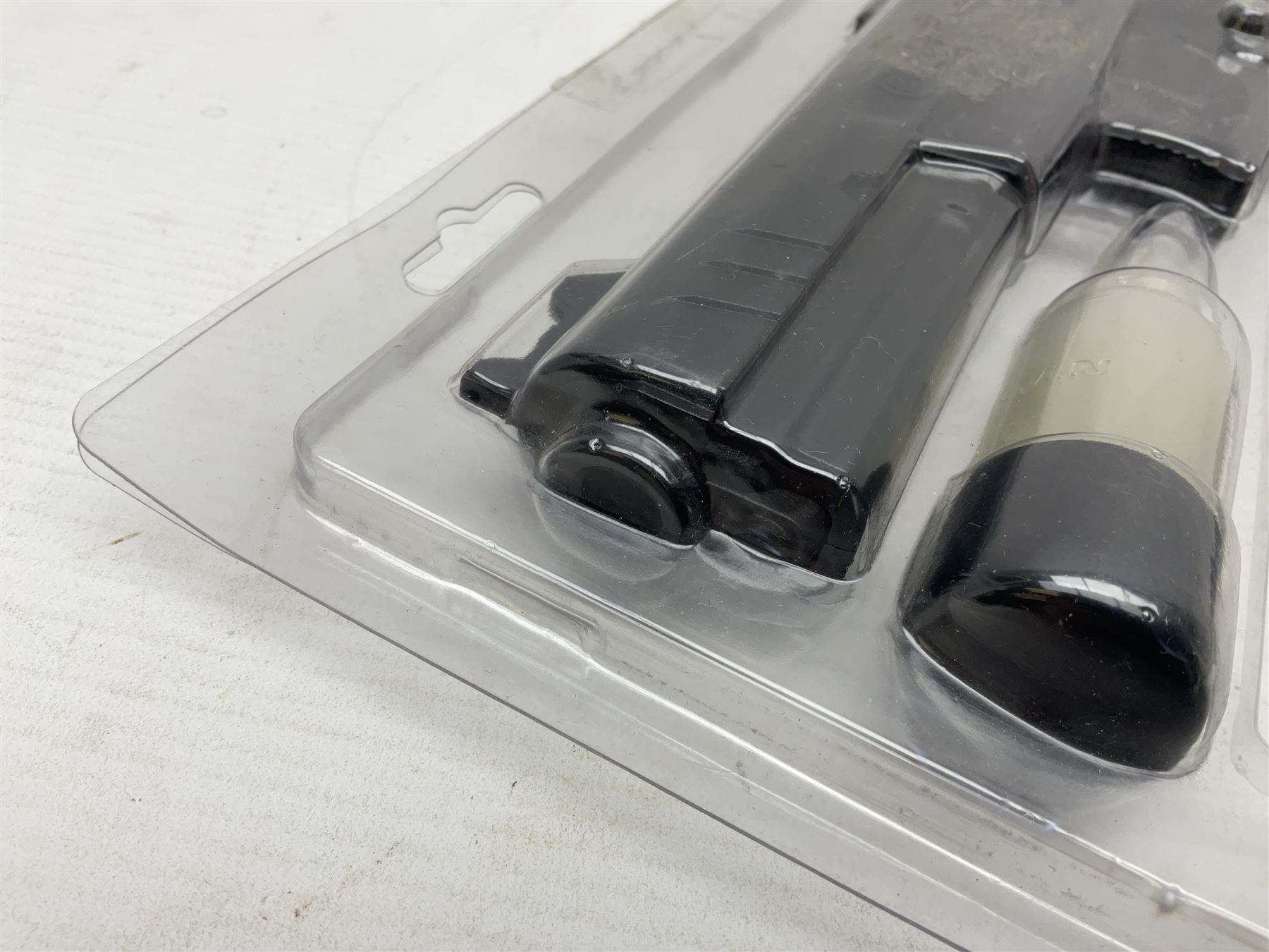 Marksman 1018 spring action BB pistol, serial no.121912951321, L27cm in original packaging with ball dispenser; and KWC .177 cal. CO2 revolver, serial no.31128882, L31cm (2)  NB: AGE RESTRICTIONS APPLY TO THE PURCHASE OF AIR WEAPONS.