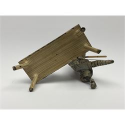 After Bergmann, two cold painted bronze figures, the first modelled as two cats on a bench hugging, the second a cat caning a kitten