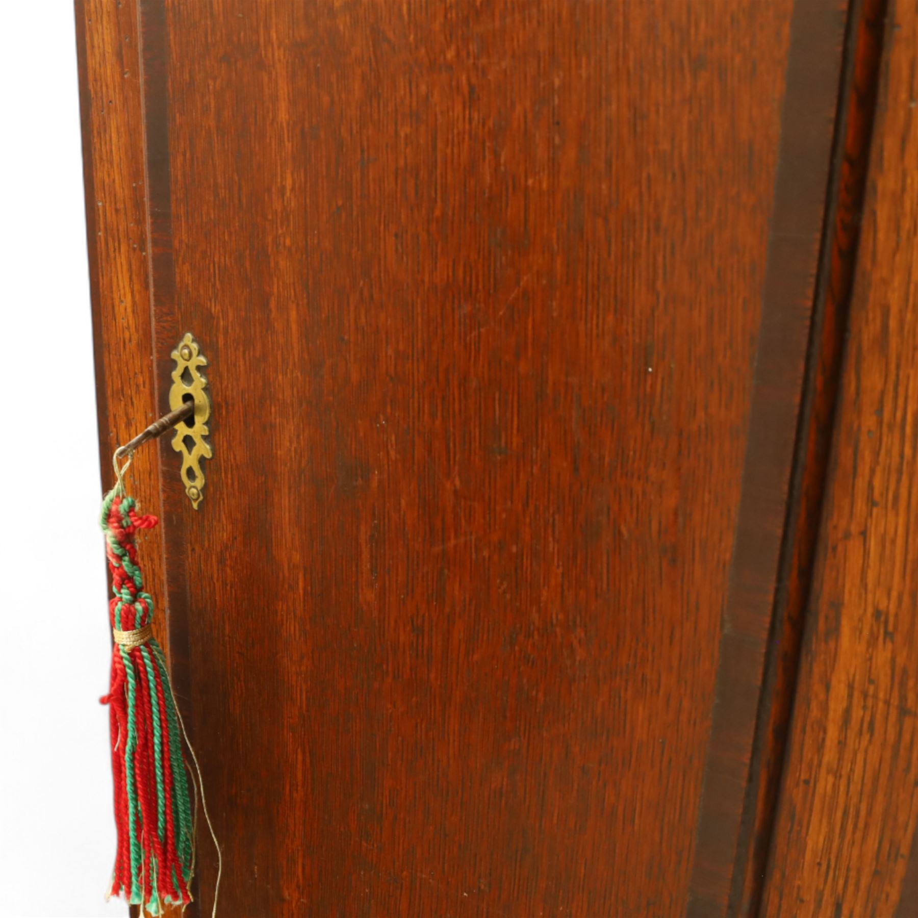 Thomas Hawkswell of Brompton (Nr Pickering-Yorks), 8-day oak cased longcase clock with a swan necked pediment and central brass finial, break arch hood door flanked by reeded pilasters with brass capitals, trunk with canted corners and a spire topped door, square plinth raised on a shaped skirting, painted dial with floral spandrels and makers name to the arch, with Roman numerals, calendar and seconds dial and pierced steel hands, dial pinned to a twin train rack striking movement, striking the hours on a bell. With weights and pendulum.