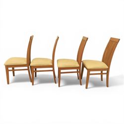 Contemporary teak dining suite comprising extending table and eight chairs, the table with rectangular plank top and one additional leaf extending to 210cm, supported on square tapering legs, the chairs with tall slatted backs and cream upholstered seats