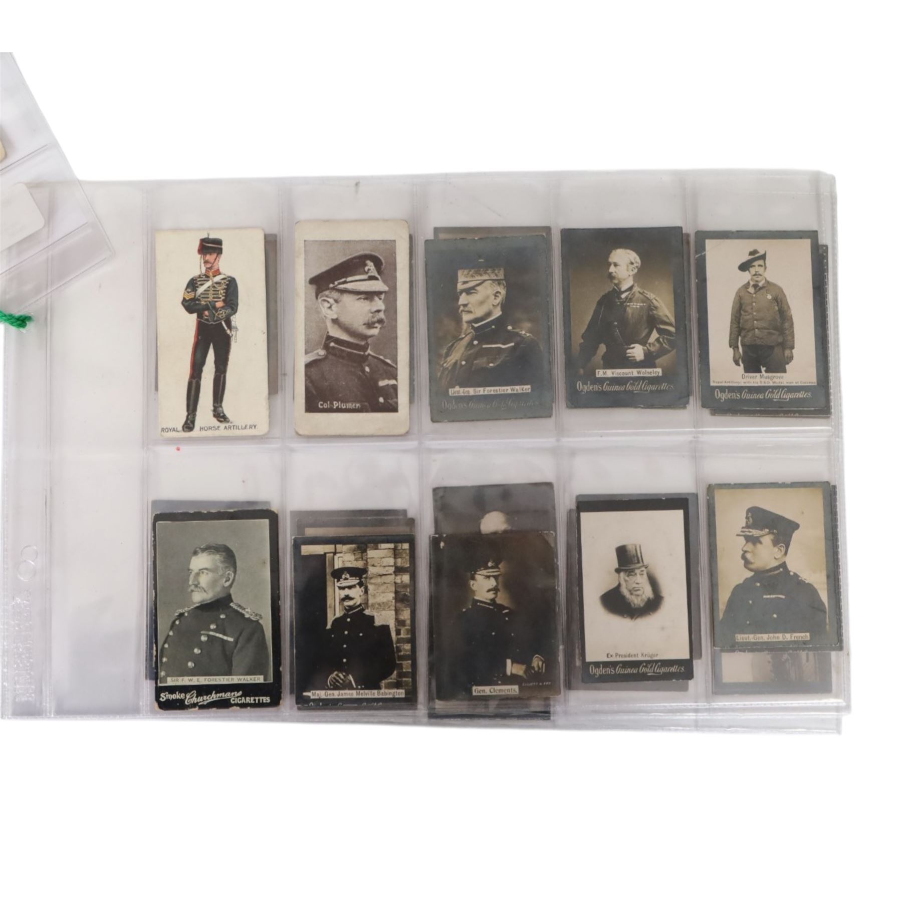 Collection of military cigarette cards, including Churchmans cigarette cards and Ogden's Guinea Cold Cigarettes