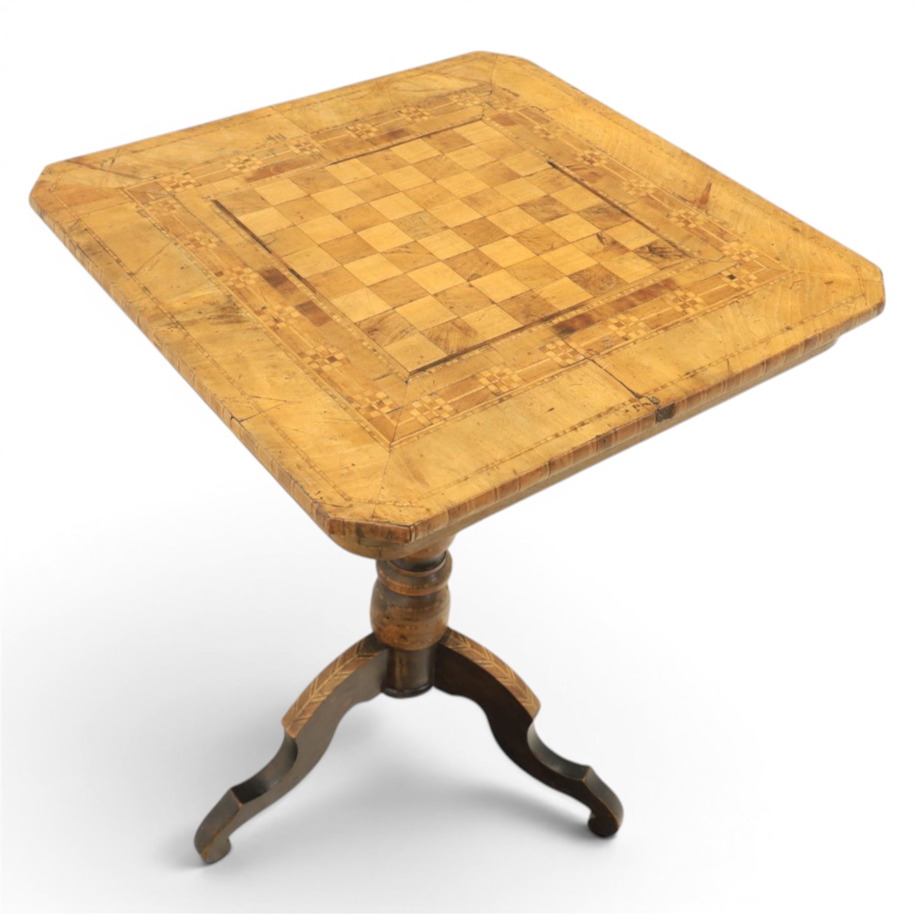 Late 19th century marquetry chess table, square top with canted corners inlaid with chessboard and geometric borders, turned pedestal column on three shaped downswept supports