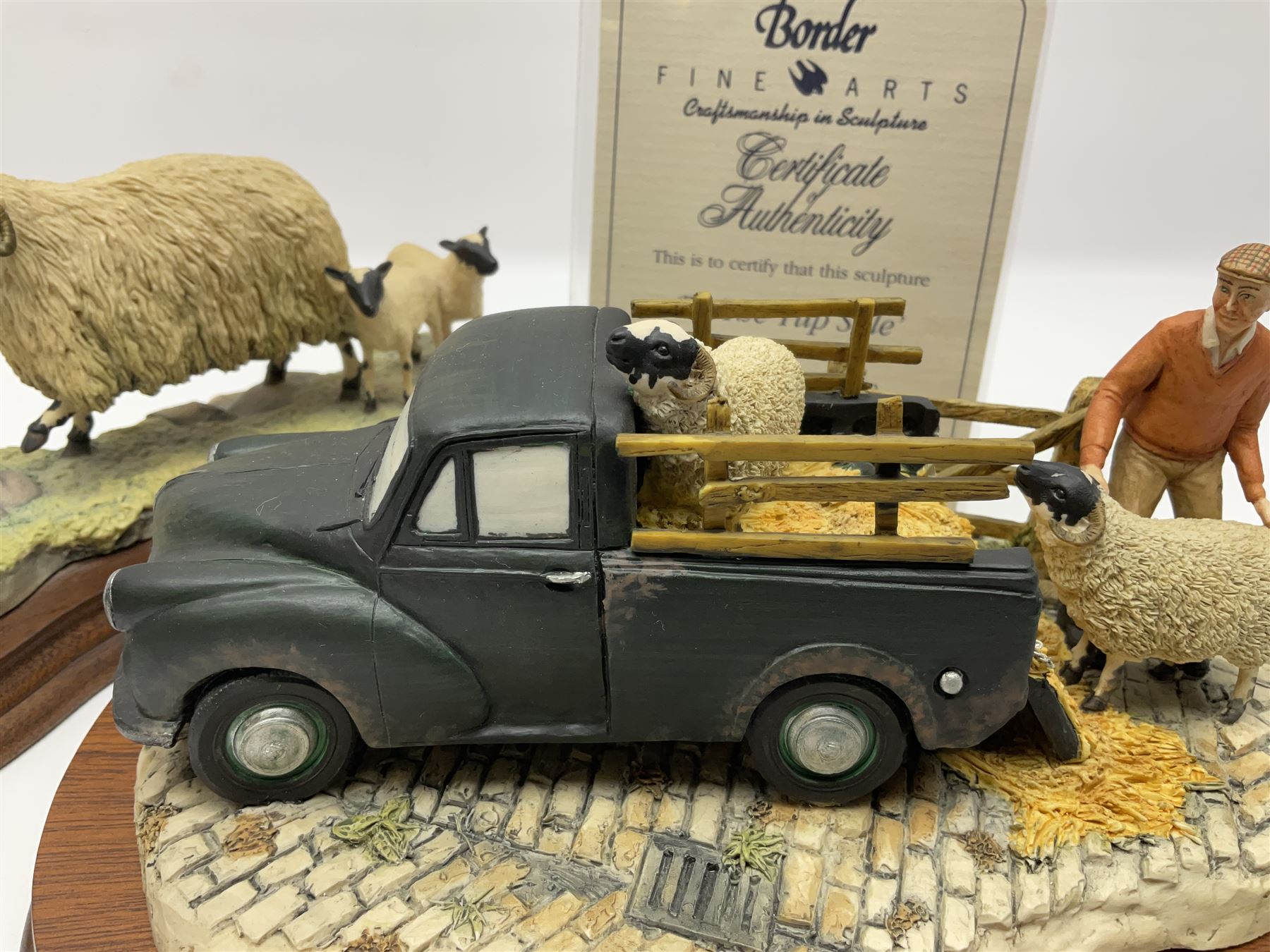 Two Border Fine Arts figure groups, comprising Black faced Ewe & Border Collie no B104 by Ray Ayres and To The Tup Sale, no JH72 limited edition 383/1850, both on wooden base, one with certificate