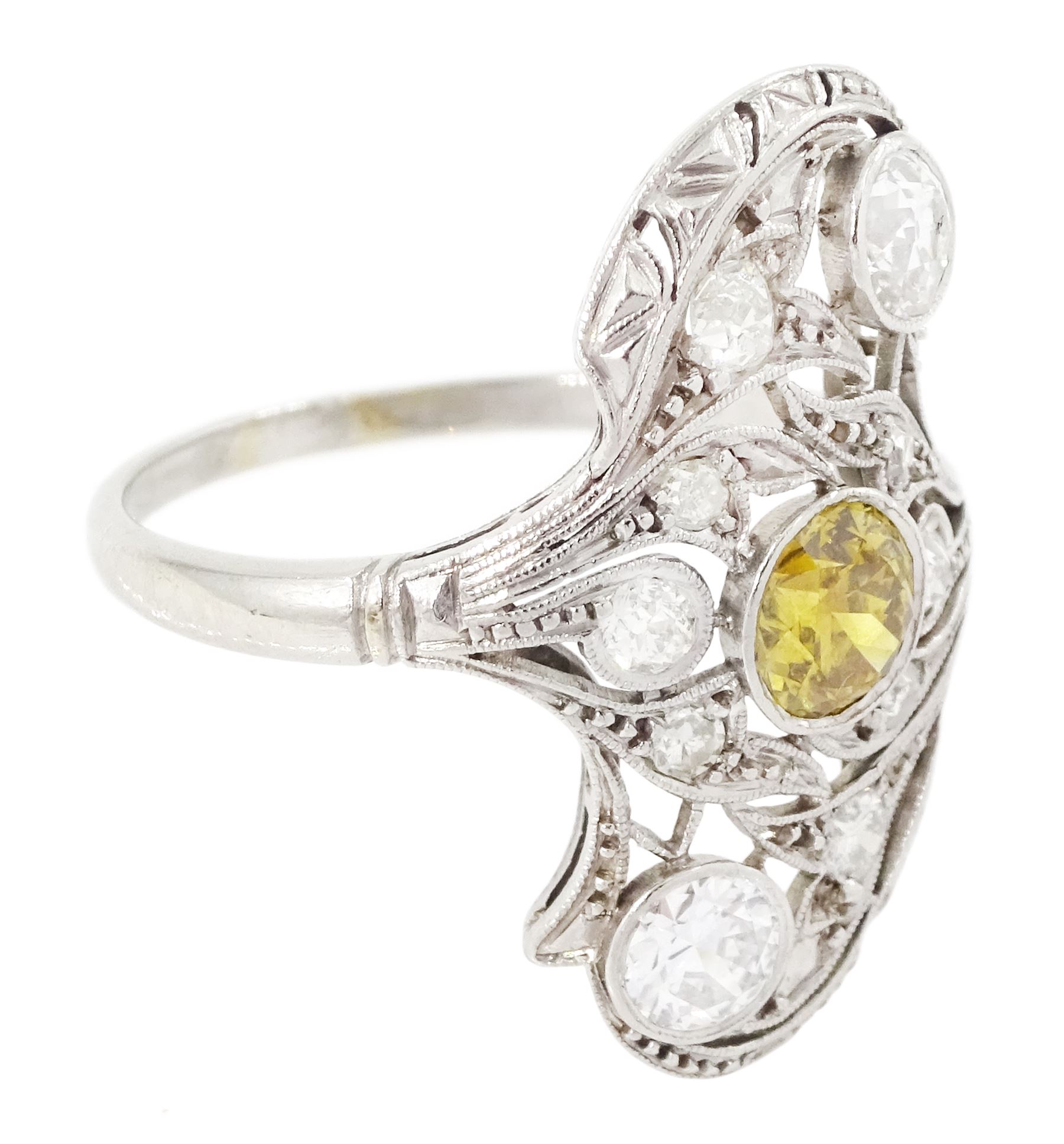 Early 20th century platinum diamond swirl ring, the principal old cut fancy yellow diamond of approx 0.50 carat, surrounded by old cut and single cut diamonds, in a milgrain pierced foliate design setting, total diamond weight approx 1.25 carat, with GCS certificate