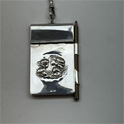 Victorian and later silver chatelaine, the shaped and foliate pierced clasp with embossed oval panel of a courting couple, hallmarked Levi & Salaman, Birmingham 1899, supporting six accessories on five chains: a circular mirror embossed with putti, hallmarked Henry Matthews, Birmingham 1911, pencil holder engraved with foliate scrolls, hallmarked Francis Webb, Birmingham 1914, conical scent bottle decorated with bamboo, (unmarked but testing as silver), aide memoire embossed with putti, hallmarked Samuel M Levi, Birmingham 1911, tape measure of compressed spherical form, hallmarked Henry Matthews, Birmingham 1899, and a purse with embossed putti, hallmarked Birmingham 1909, makers mark worn and indistinct, at longest point L31cm

