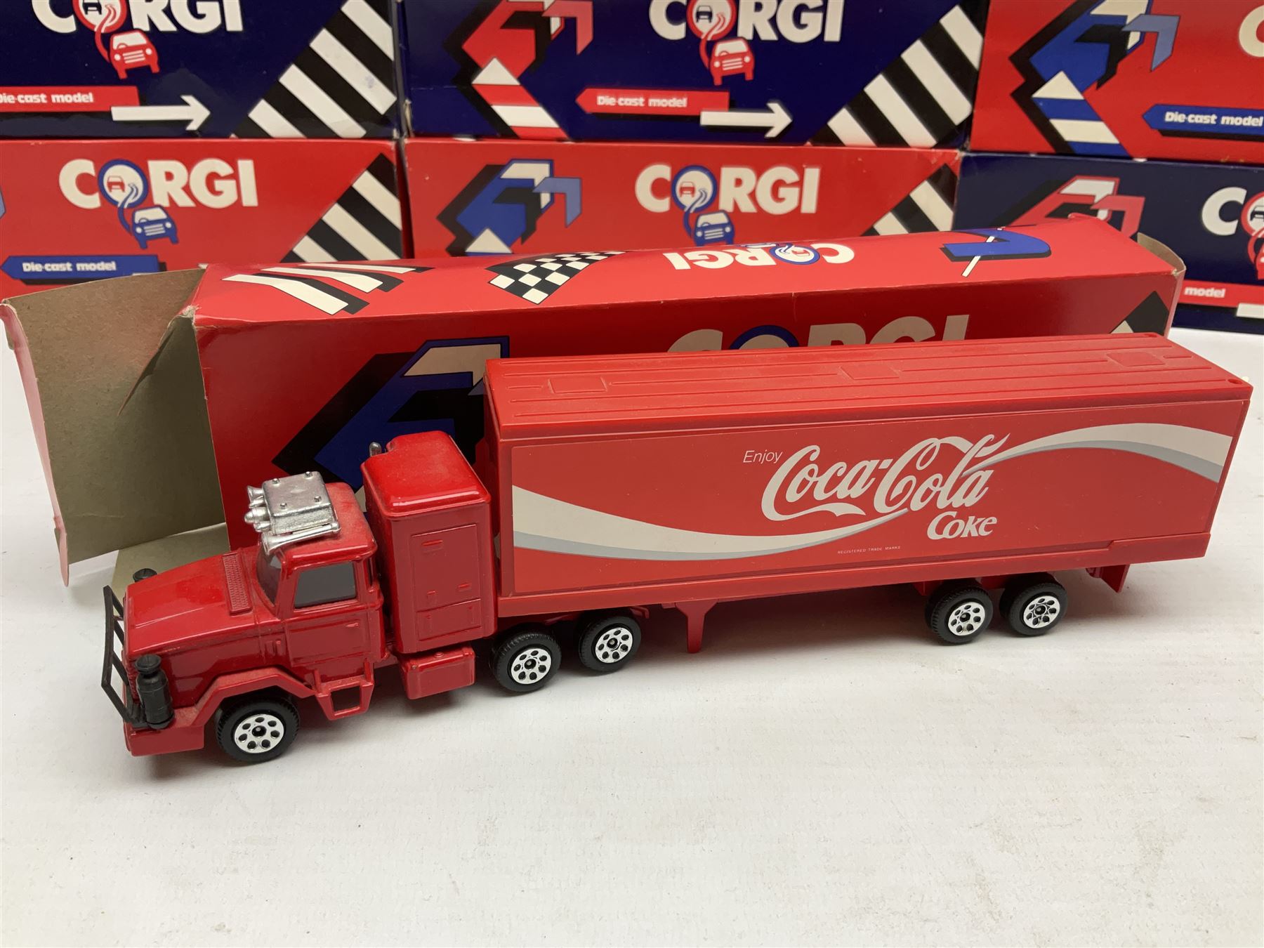 Corgi - thirty-four modern die-cast models including cars, commercial vehicles, racing cars, sports cars, car transporters etc; all boxed; Bburago boxed set of five cars; four Matchbox Originals blister packs etc