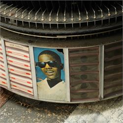 Ditchburn - 'Music Maker Panoramic 200' jukebox circa 1959, curved panoramic glazed front offering full view of the automatic selection process, accommodating 100 records (200 selections), with a stereo sound system, the aluminium trim over a woven speaker grille with an all-over ebonised and silver finish