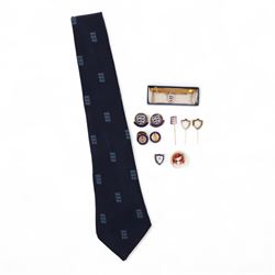 England football enamel buttons, badges and pins, including rolled gold tie clip and pin with enamelled three lions emblem, two FA Tour 1961 buttons/badges and an FA Coach enamel badge/pin, together with a dark blue tie with light blue three lions emblems, three Leicester City enamel tie pins and a Scarborough FC 'No Battle No Victory' enamel badge, all from the estate of former Leicester City player and Scarborough FC manager Colin Appleton