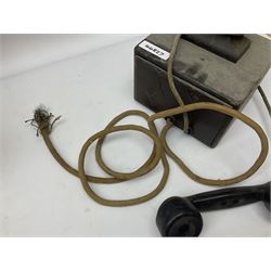 Early-mid 20th century internal telephone system, comprising exchange box with attached TMC rotary telephone and dictograph with Bakelite handset and support upon stained wood case, and 1960s black Bakelite telephone model 312L with G.P.O sticker beneath, largest H30.5cm W36.5cm D30cm