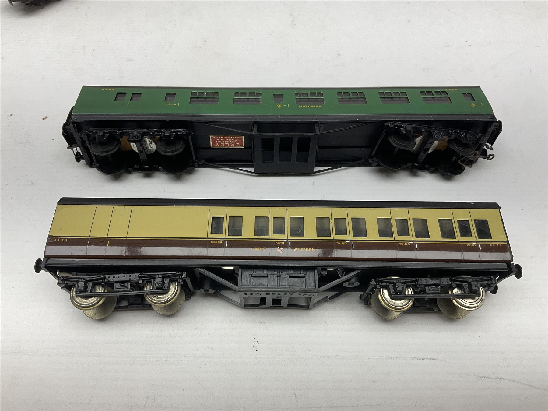 Exley '00' gauge - fourteen various coaches comprising four LMS maroon (3322 3rd, 2202 3rd, 6665 3rd and 388 Sleeping Car 3rd), LNER green/cream Buffet Car 21419, LNER teak 8639 1st, Southern green 6688 3rd, GWR brown/cream 3322 3rd, LNER 206 3rd, LNER 319 1st/3rd, SR green 351 3rd, SR green 188 Parcel Van, GWR 331 3rd and GWR 362 3rd; all unboxed (14)