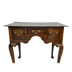 18th century oak low-boy, rectangular top over three crossbanded and cock-beaded drawers, ogee and stepped arch apron, on cabriole supports 