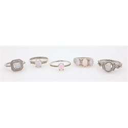  Five opal set silver rings stamped SIL or 925  