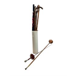 Copper coaching horn, together with walking sticks, foil etc