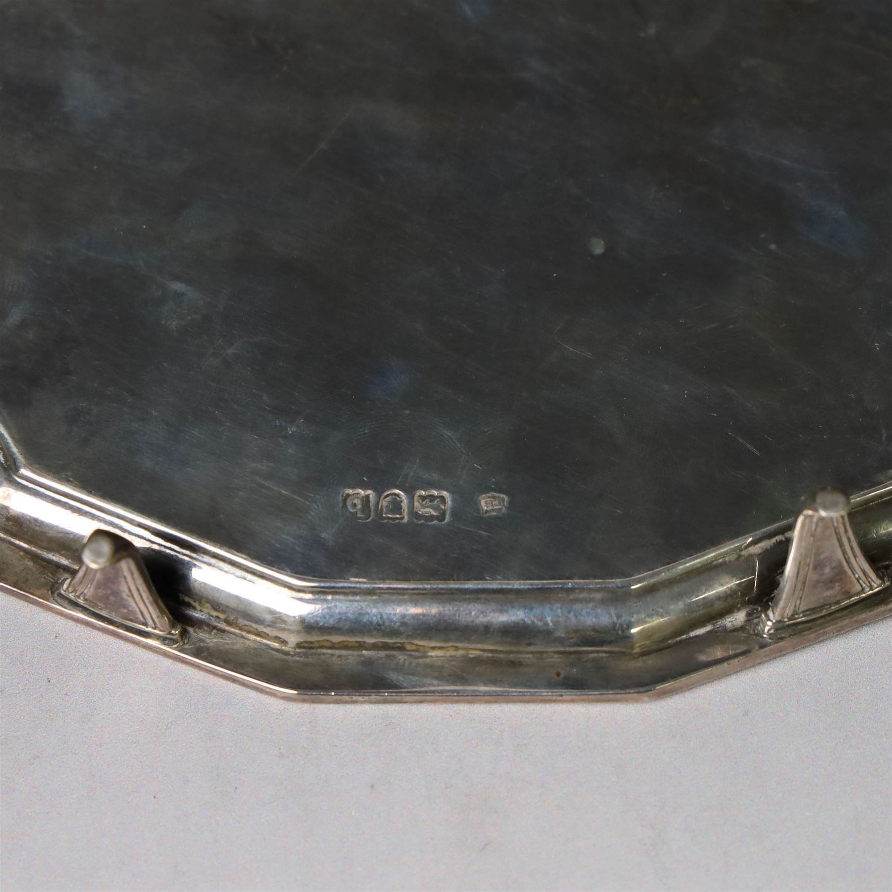 Victorian silver teapot stand, with chippendale style rim and engraved crest to centre, upon four pad feet, hallmarked Thomas Bradbury & Sons, London 1897, W18cm