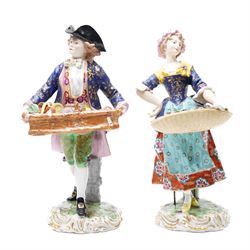 Pair of 19th century Samson of Paris figures of male and female itinerant milliners, each ...
