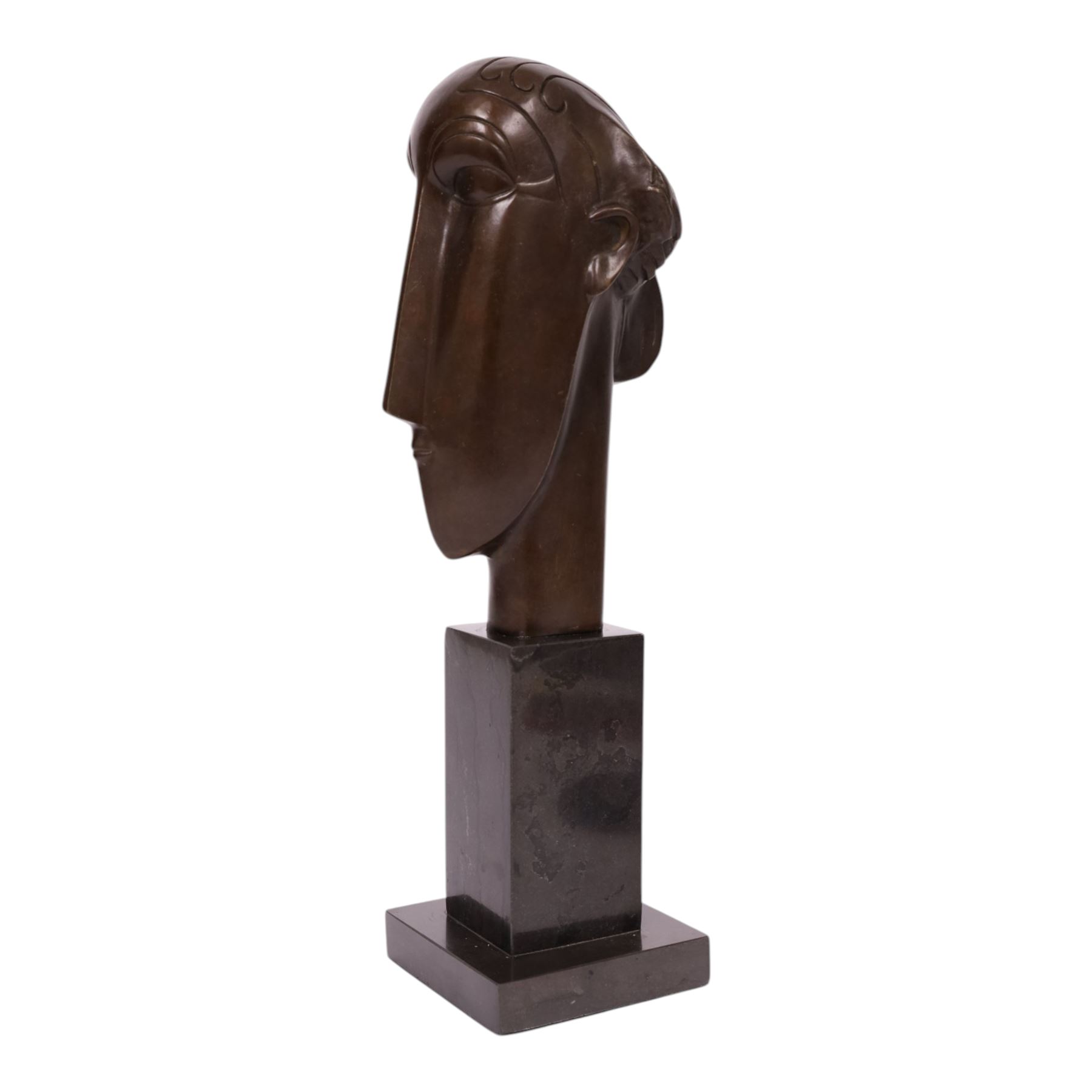After Amedeo Modigliani - bronze sculpture modeled as a female face, upon a square base, overall H38cm