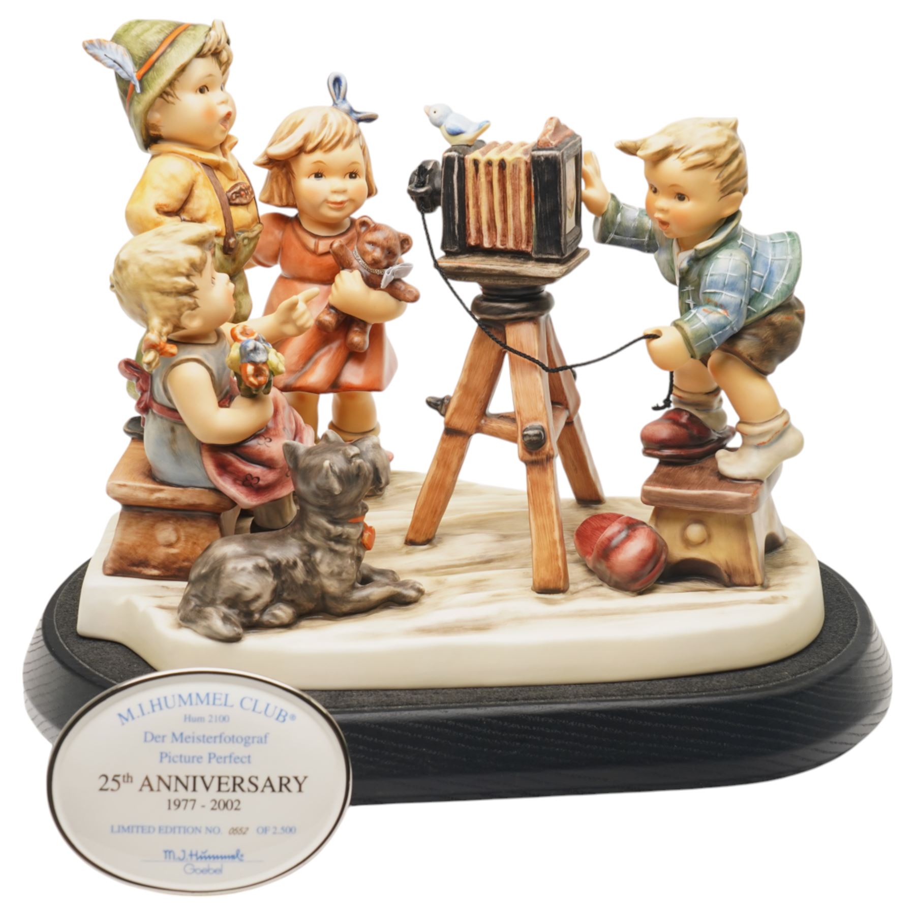 Goebel M I Hummel Club limited edition 25th Anniversary Group figurine 'Picture Perfect', numbered 552/2500, modelled as four children taking a photograph, with stand and plaque, printed marks to base, excluding plinth W27cm 