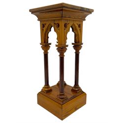 19th century pitch pine ecclesiastical pedestal stand, the square chamfered top over cusped Gothic pointed arches and four turned column supports, stepped and moulded plinth base