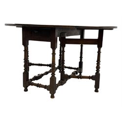 18th century oak drop leaf table, oval top with two drop leaves and frieze drawer, raised on turned supports with turned stretchers