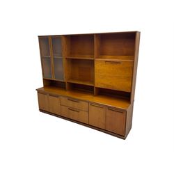 G-Plan - teak wall unit, the upper section fitted with two glazed doors, fall front compartment and shelves, the lower section fitted with two double cupboards and two drawers (W201cm, H65cm, D46cm); together with a corner shelving unit (W62cm, H165cm)