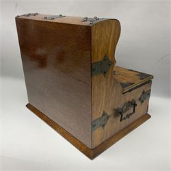 Victorian oak tantalus, mirrored high-back with recess for housing the decanters, behind a hinged box, with cribbage board to the concealed drawer below, marked Barman, London, H33cm, L37cm