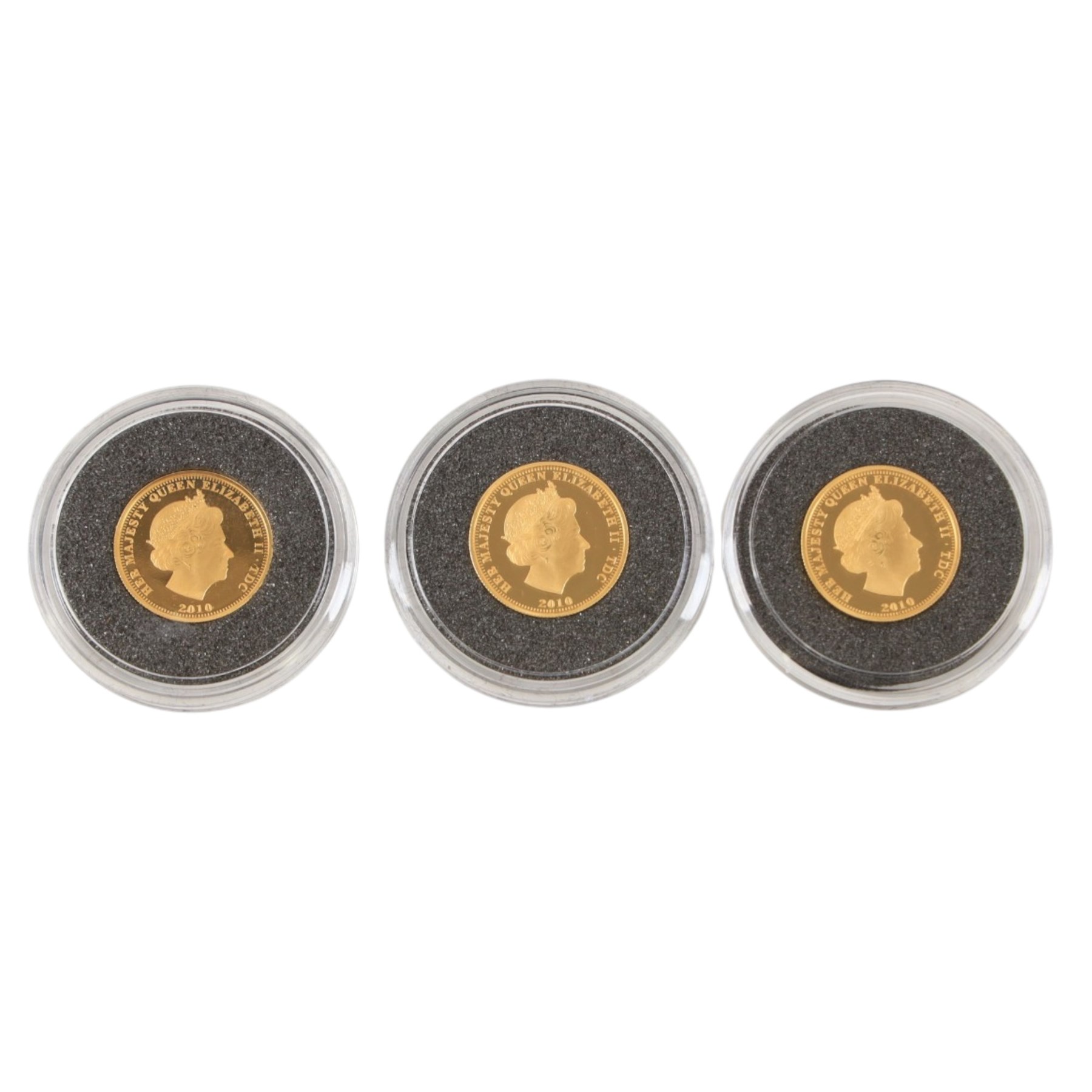 Queen Elizabeth II Tristan da Cunha 2010 'Year of Three Kings' gold proof three coin set, comprising three one crown coins, issued by The London Mint Office, cased with certificate